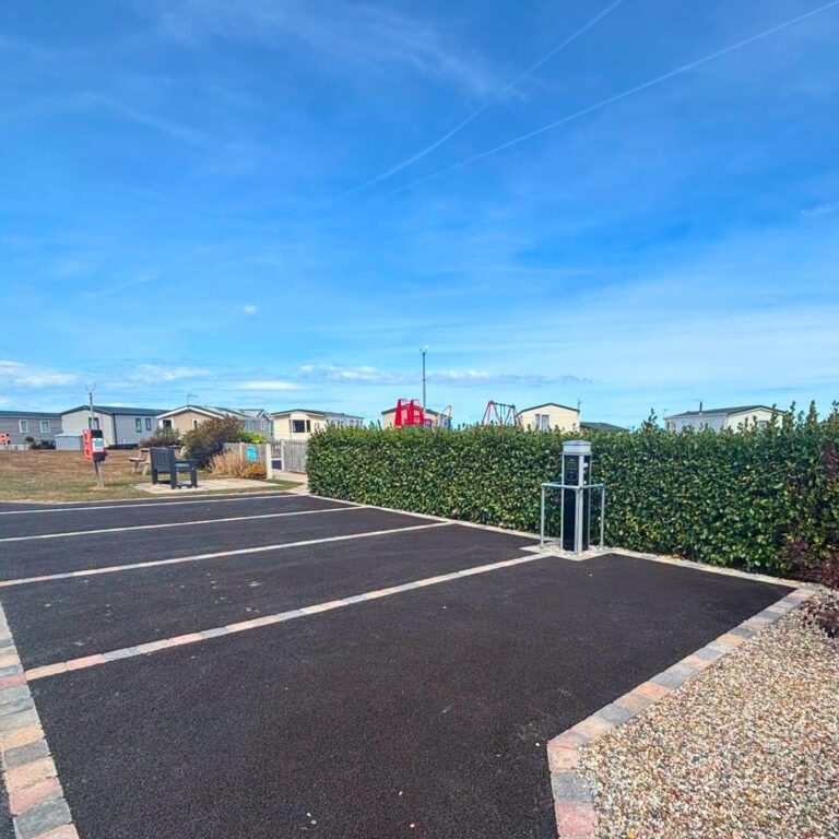 Electric vehicle charging bays at The Beach Caravan Park