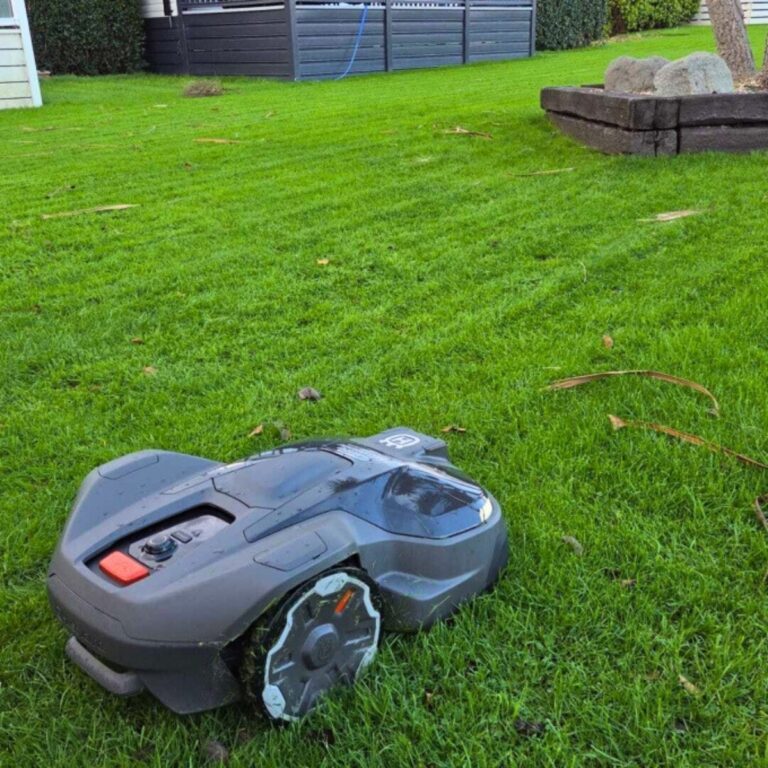 Husqvarna robotic mower cutting grass at The Beach Caravan Park